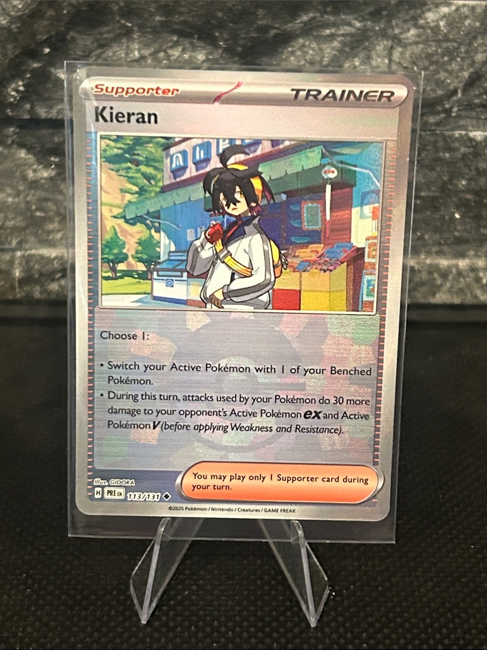 Pokemon Kieran Pokeball 113/131 Holo from Prismatic Evolutions M/NM